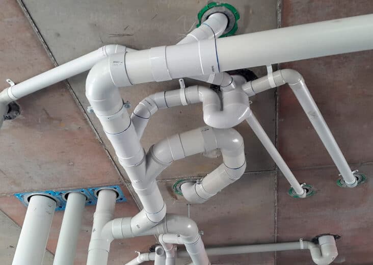 How To Hide Exterior Plumbing Pipes